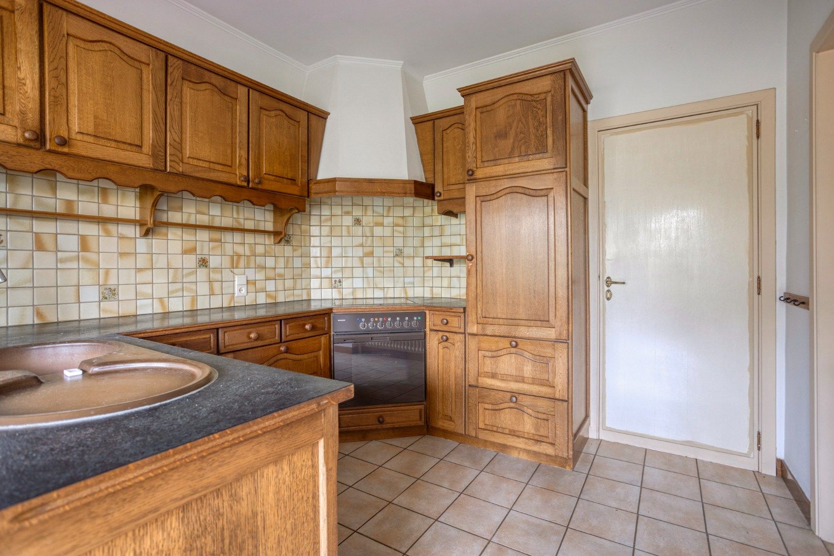 Halfopen bebouwing met 4 slaapkamers,  bureau en ruime tuin in Kessel-Lo - bewoonbare opp. 179 m²  foto 6