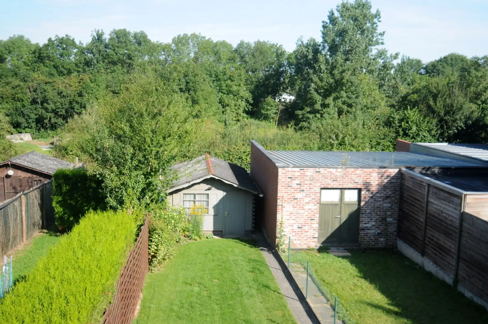 Op te frissen rijwoning met tuin, garage en 2 slaapkamers te Marke foto 9