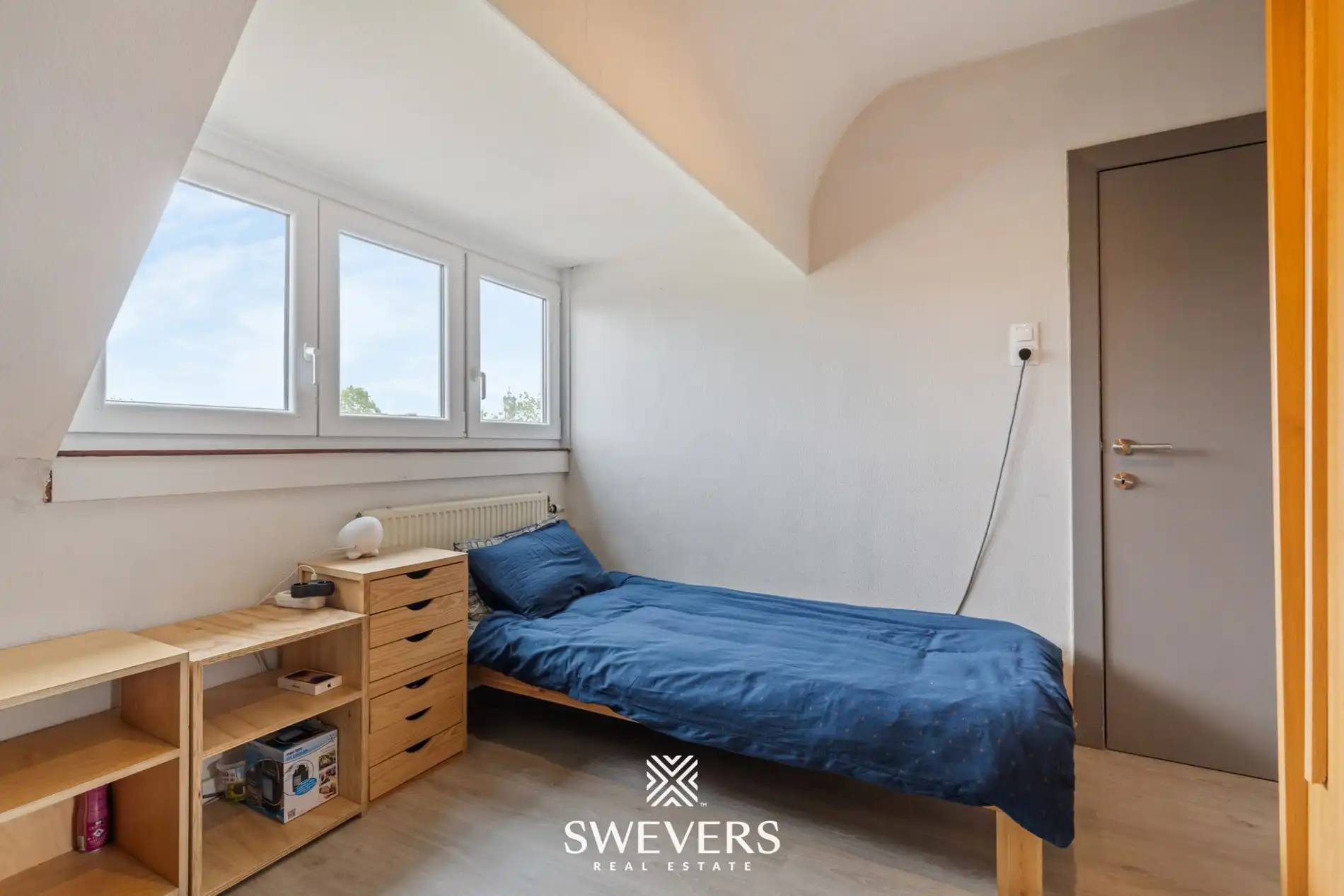Instapklare rijwoning met 2 zeer ruime slaapkamers en uitstekende ligging foto 14