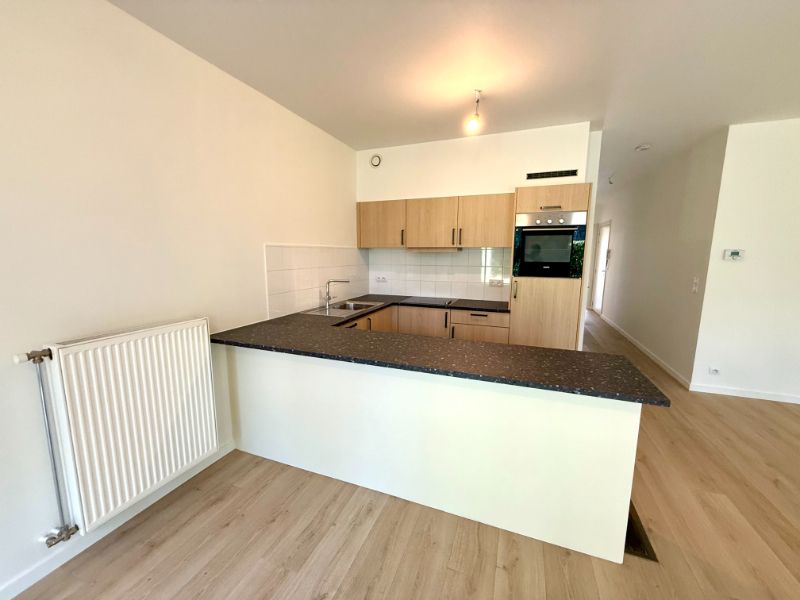 Centraal gelegen, gelijkvloers appartement met 2 slaapkamers en ruim terras met zicht op de Leie foto 9