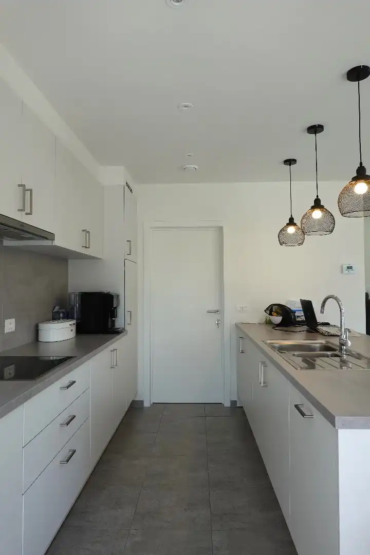 Prachtige halfopen nieuwbouwwoning met inpandige garage en zuidgerichte tuin foto 7