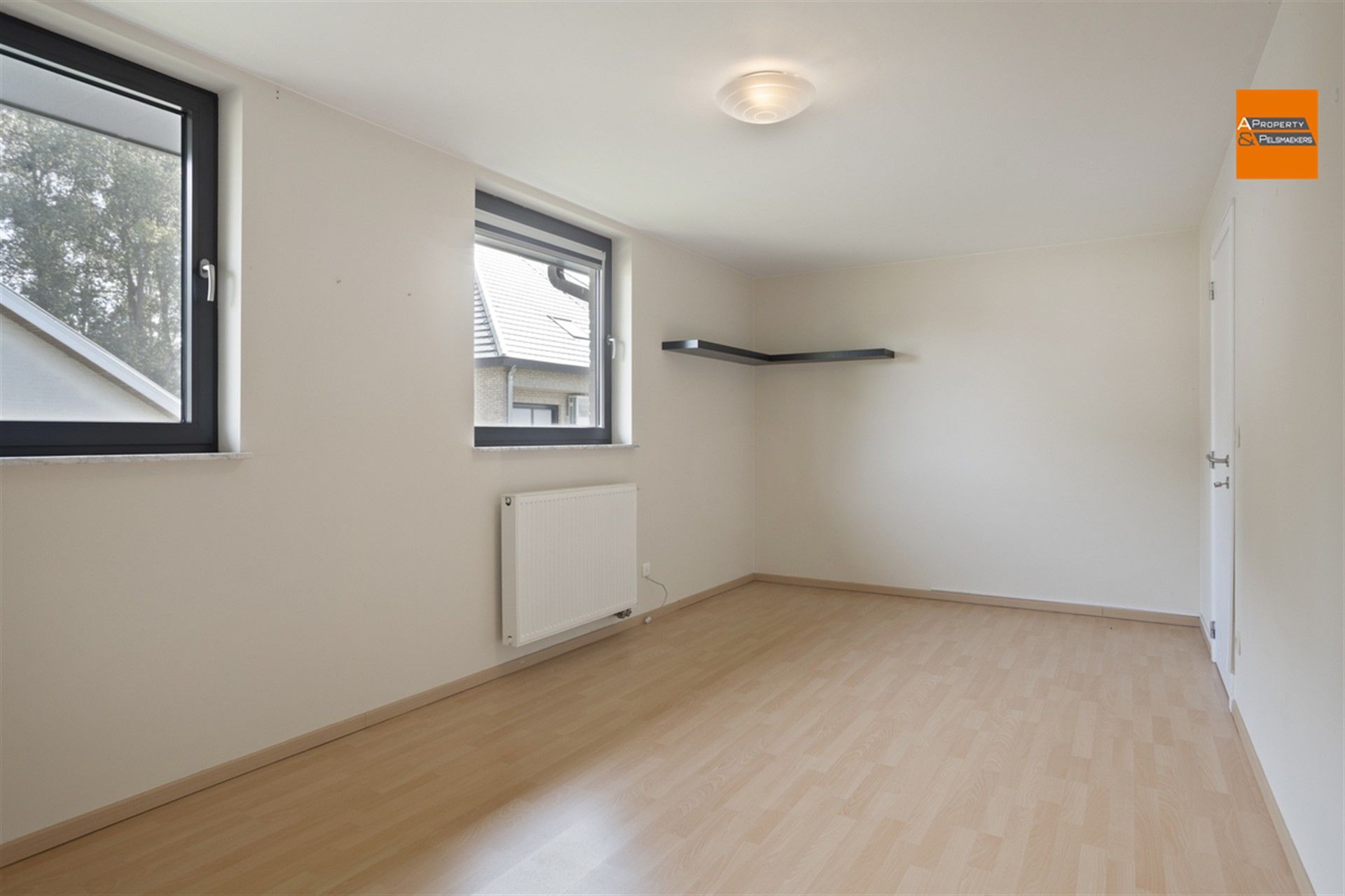 Een stijlvolle villa gelegen in een rustige straat in Kortenberg.

 foto 8