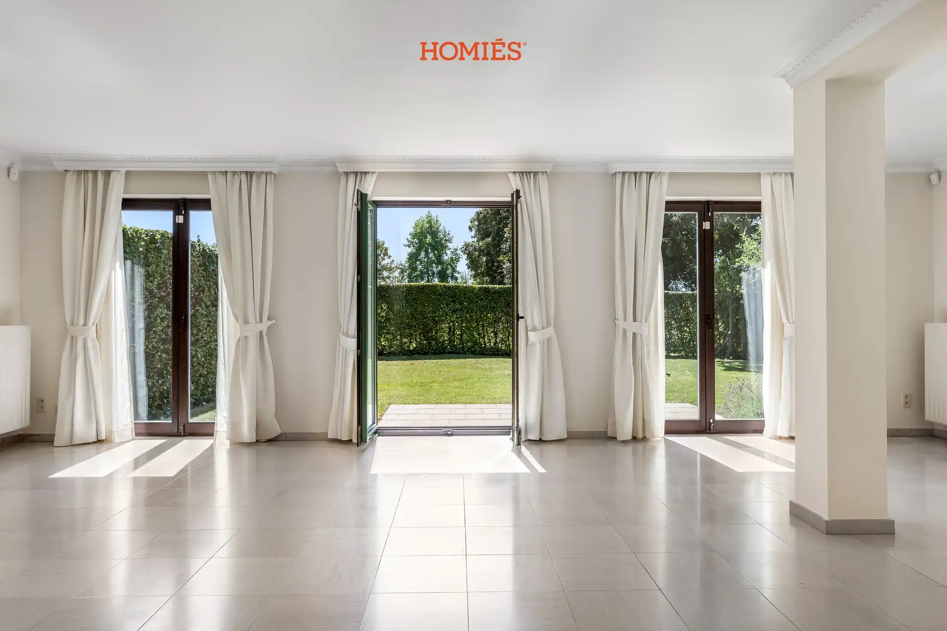 Ruim gelijkvloersappartement met zonnige privatieve tuin en veel privacy foto 4
