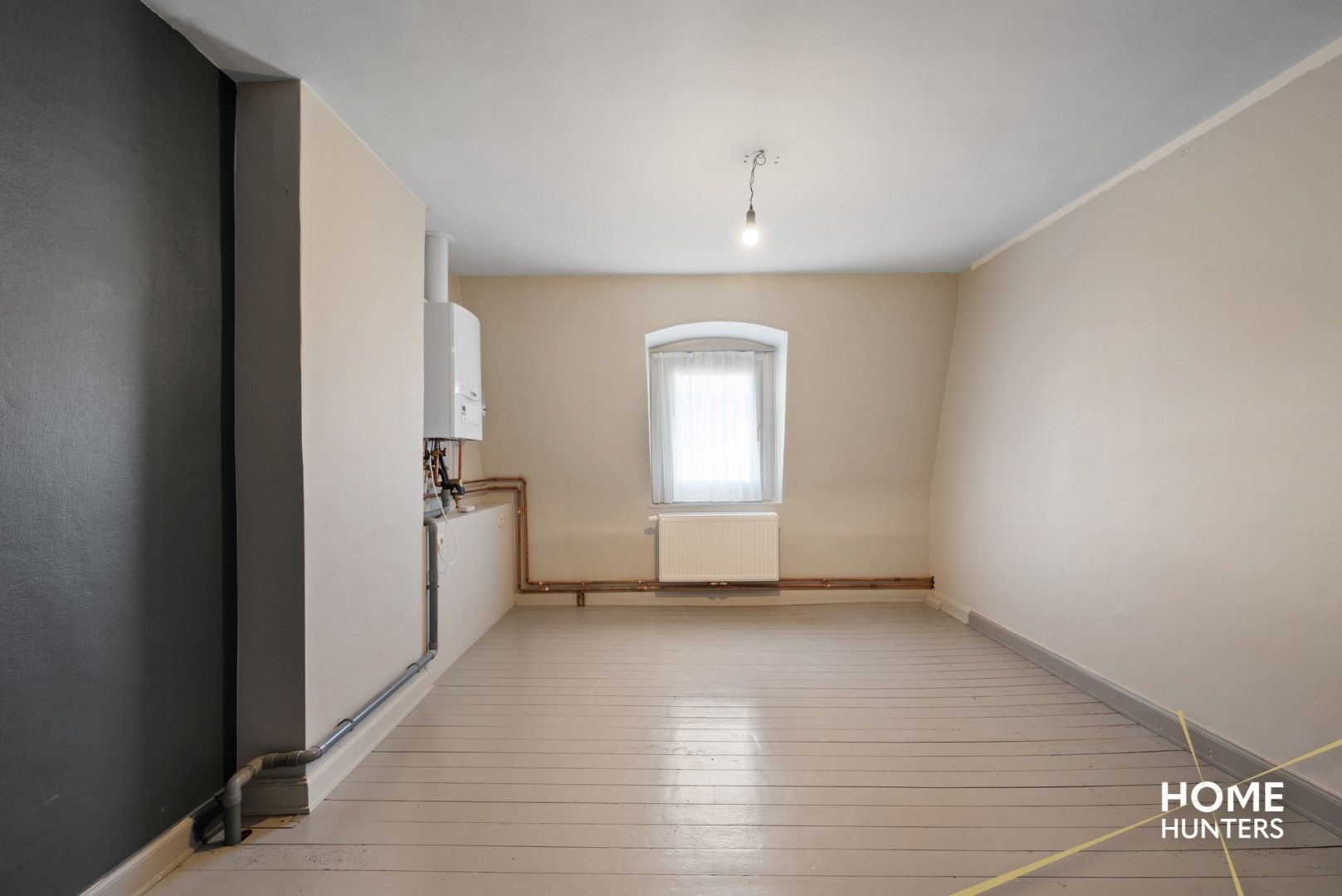 Gezellig duplexappartement met 3 slaapkamers en een zonnig terras te Ieper foto 12