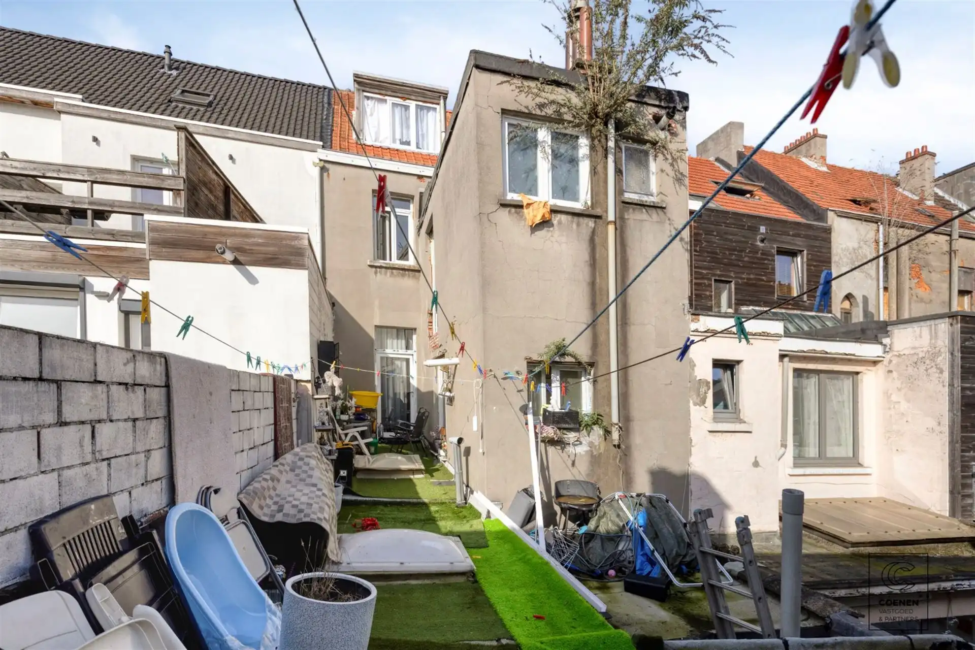 Handelswoning, momenteel ingericht als handelsruimte en 2 app. op goede ligging te Antwerpen! foto 24