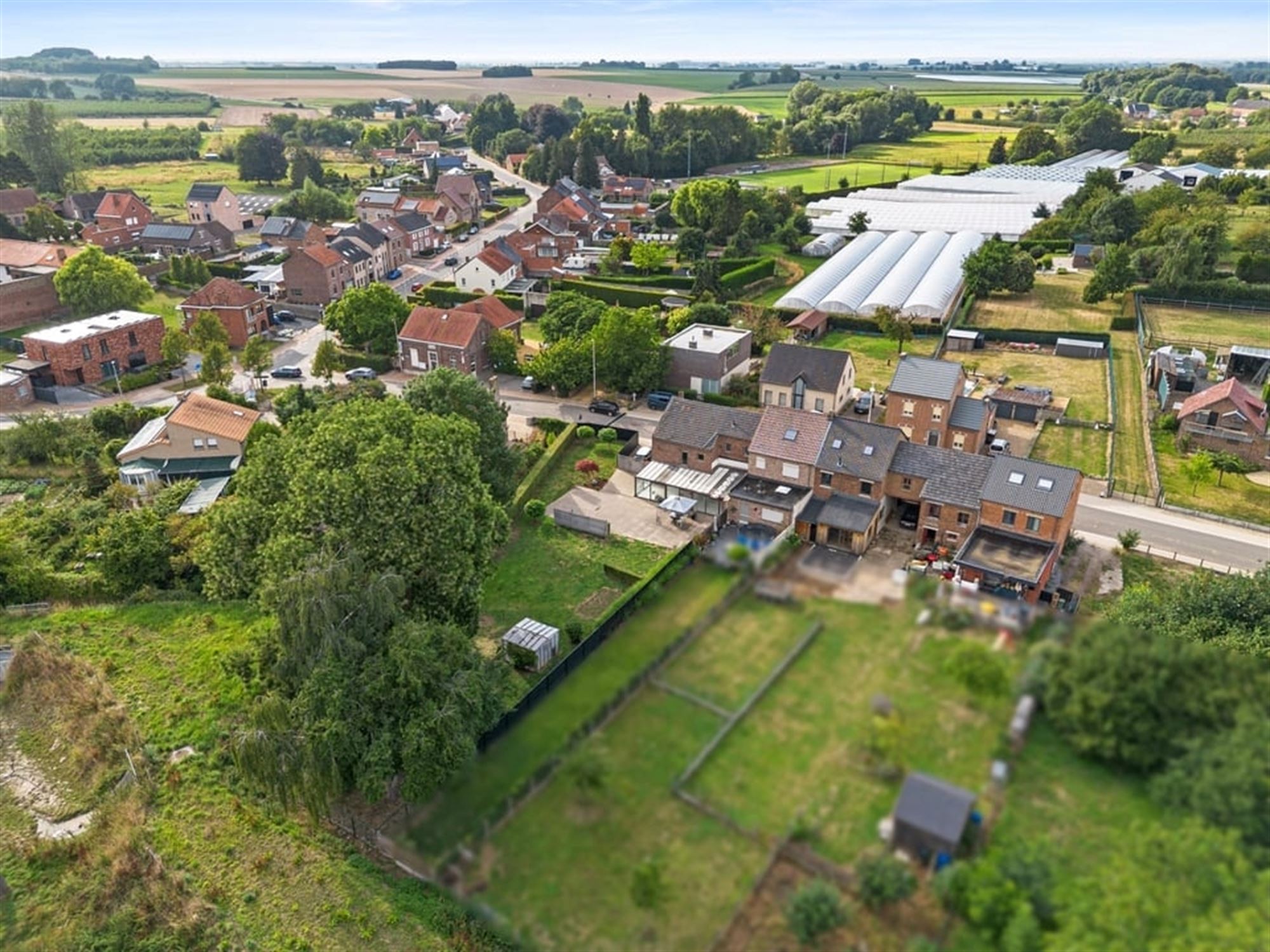 CHARMANTE GEZINSWONING OP EEN RUIM PERCEEL IN BUVINGEN foto 34