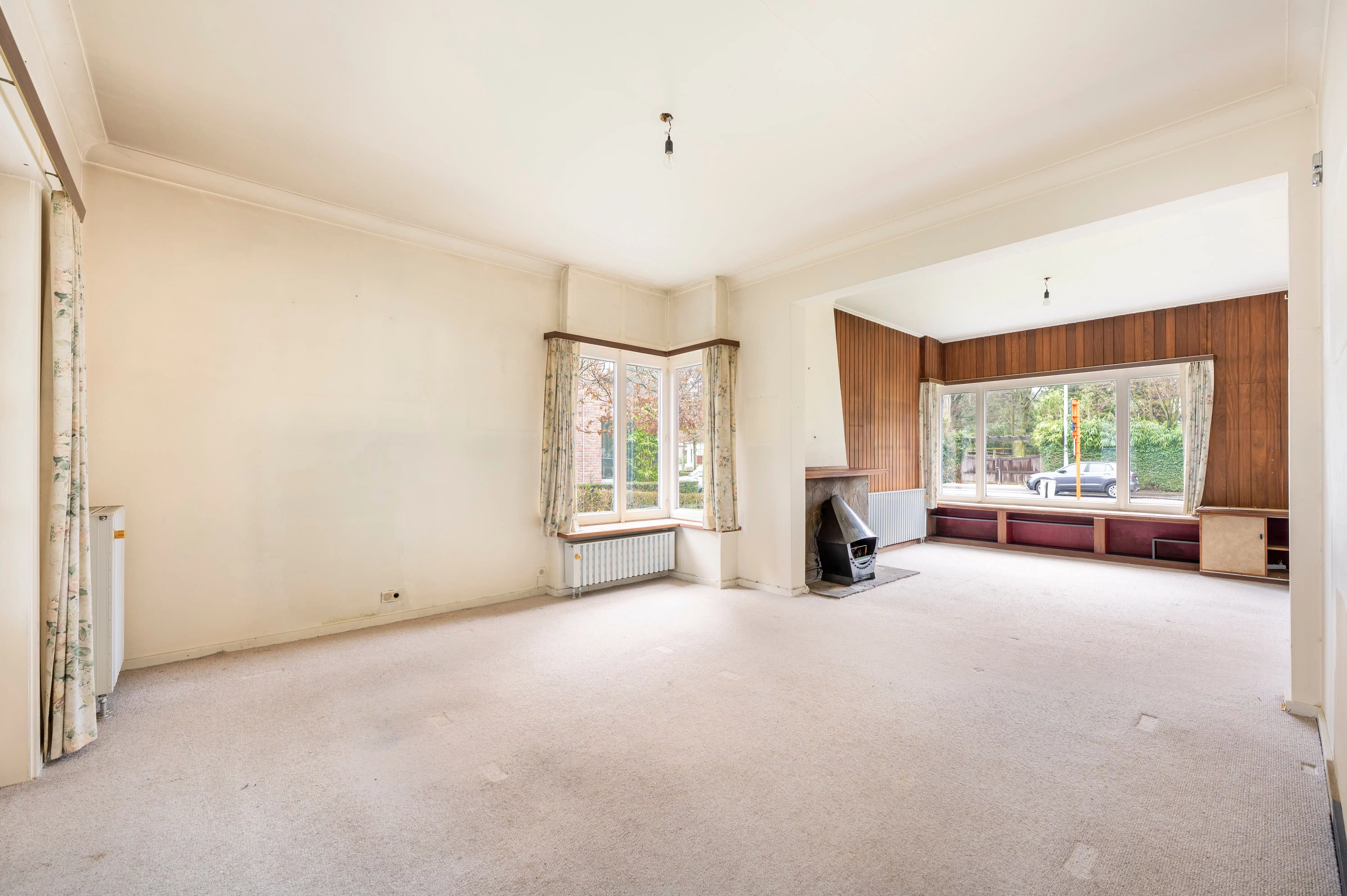 Halfopen bebouwing met veel potentieel, zonnige tuin en garage in Kapellen! foto 5