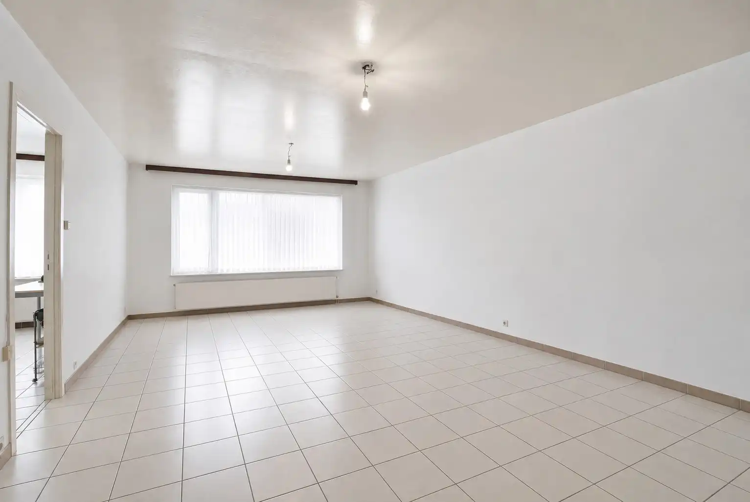 Lichtrijk appartement met 2 slaapkamers en terras – EPC D in hartje Tielt! foto 4