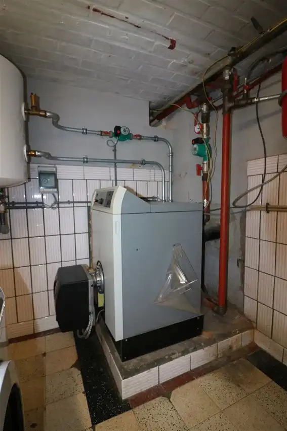 Gusting gelegen woning met 2 slpk, garage en tuin foto 24