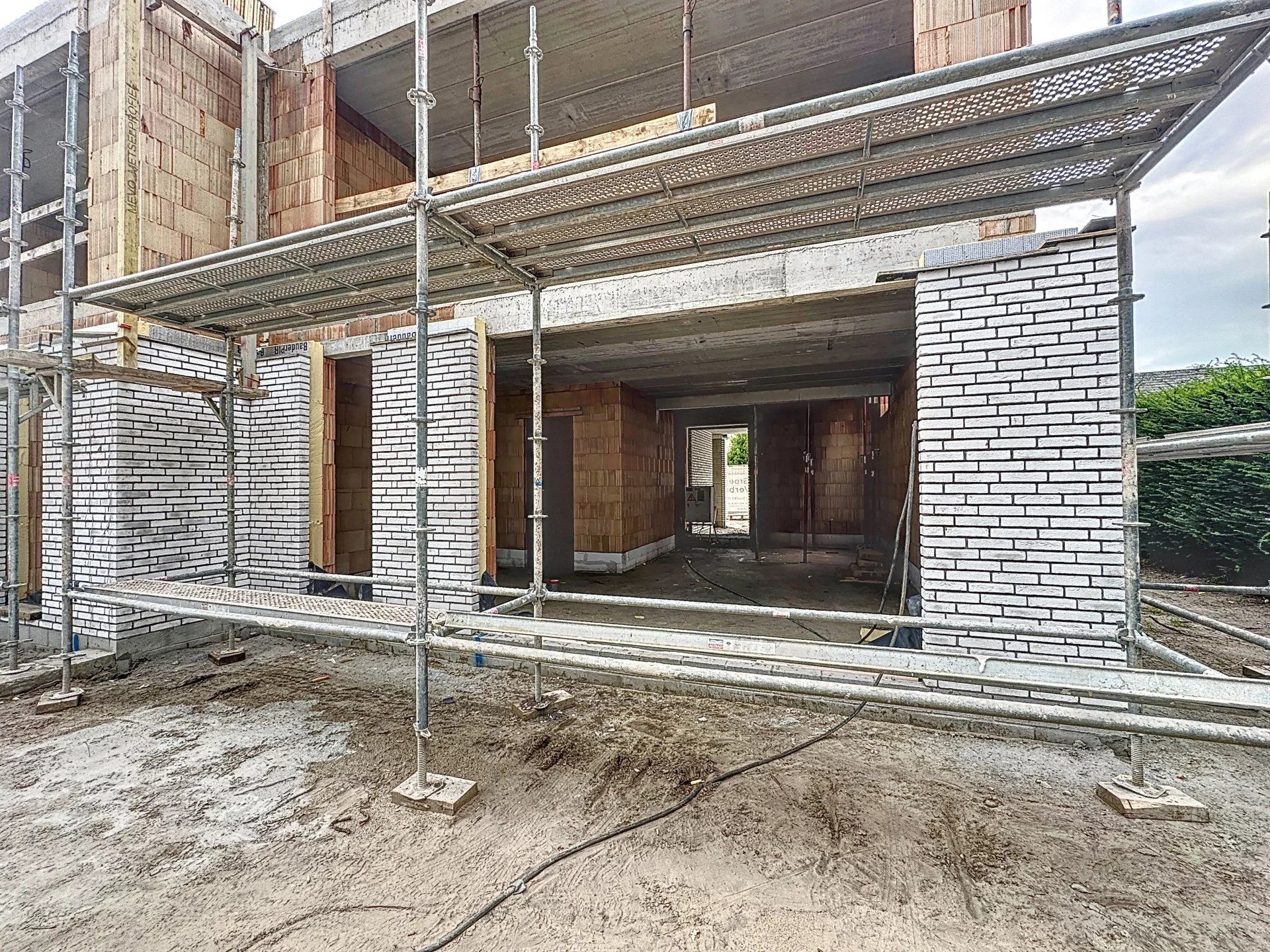 3 geschakelde woningen met tuin. Luxe afwerking! foto 18