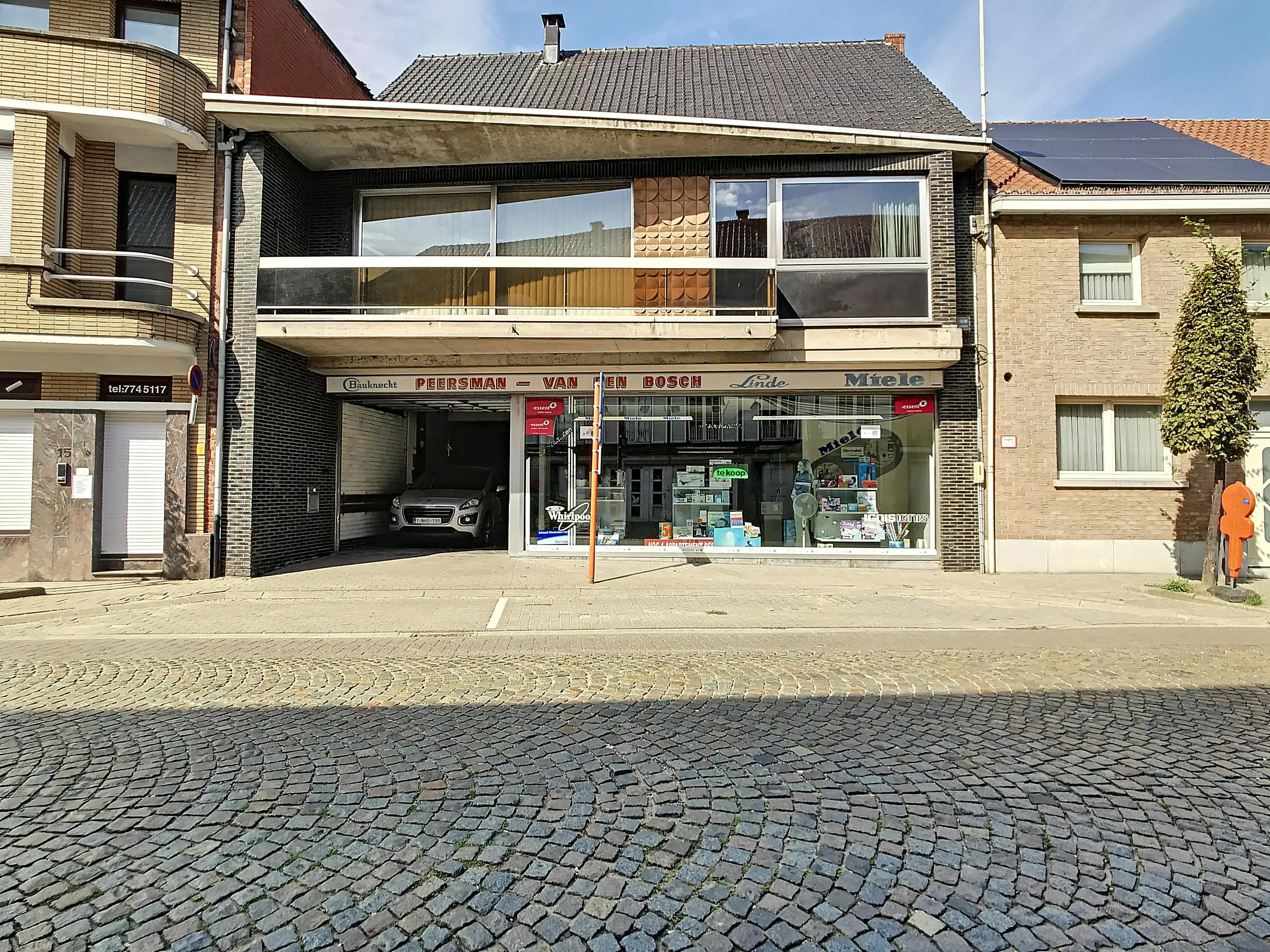 Hoofdfoto van de publicatie: Te renoveren handelspand met appartement en tuin in Bazel
