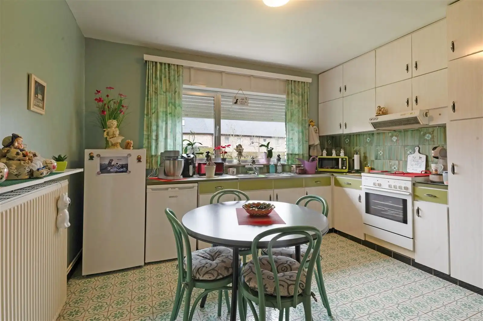 Gelijkvloers Appartement met garage en tuin foto 10