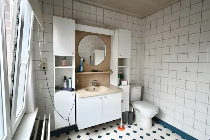 Karaktervolle handelswoning met woonst op toplocatie in het centrum van Deinze foto 17