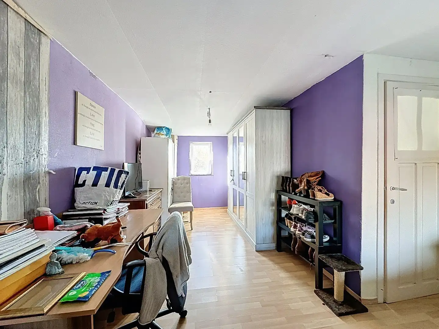 Ruime Gezinswoning met Zonnige Tuin en Renovatiepotentieel foto 14