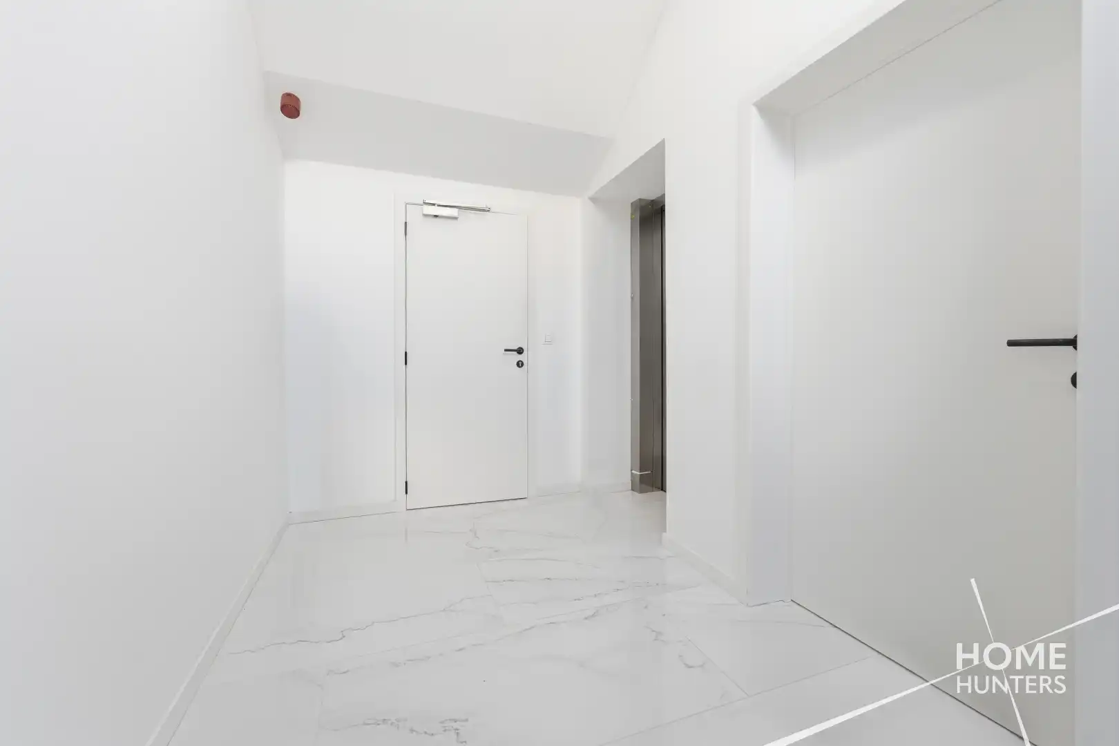 Ruim dakappartement met royaal terras en een schitterend uitzicht over Ieper foto 3