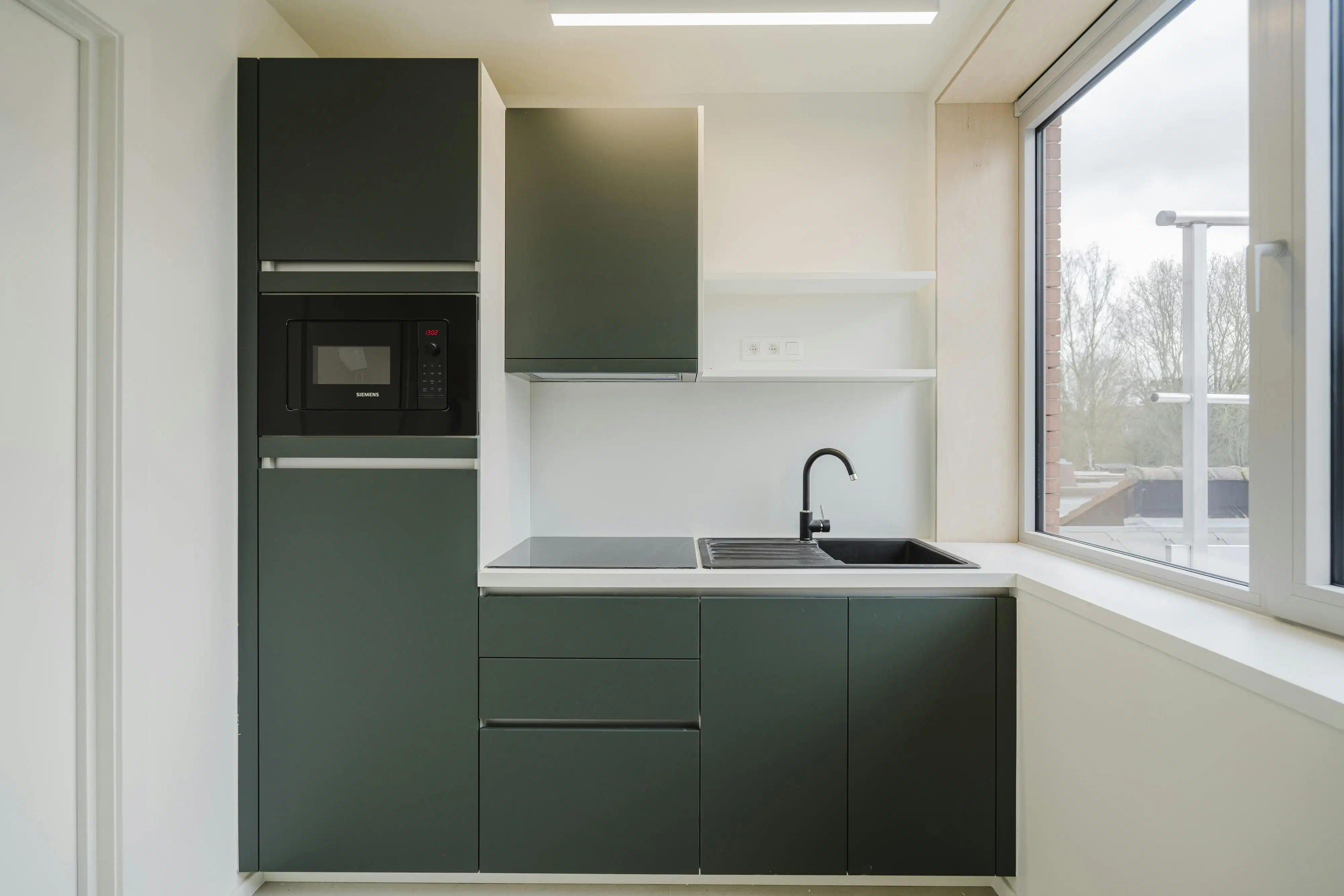 Opbrengsteigendom te koop te Kortrijk – nieuwbouw in één geheel foto 5