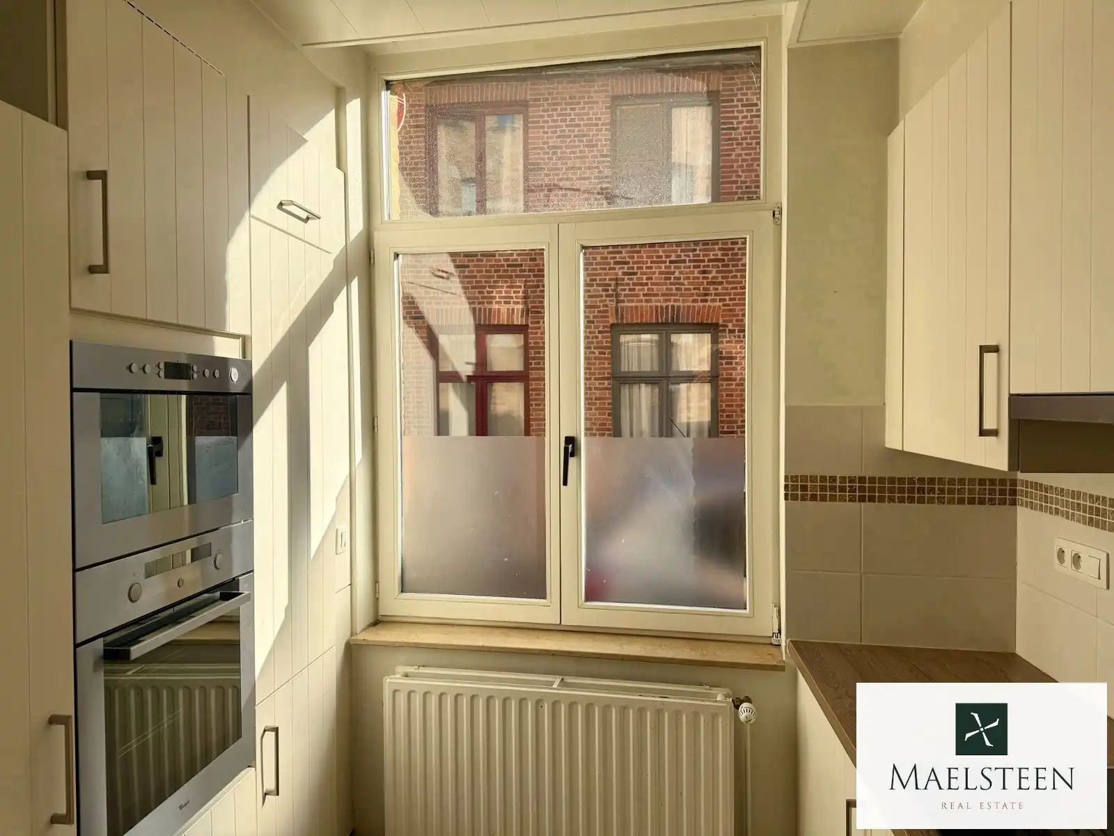 Instapklare trapgevelwoning, gelegen in Brugge centrum foto 7
