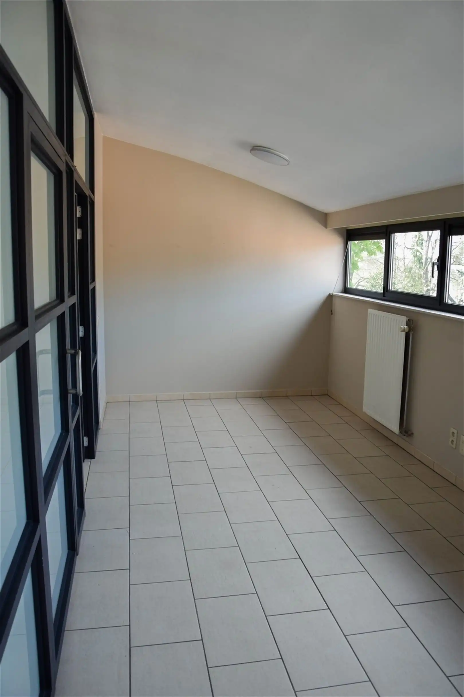 Centraal gelegen 2 slaapkamer appartement met ruim terras foto 12