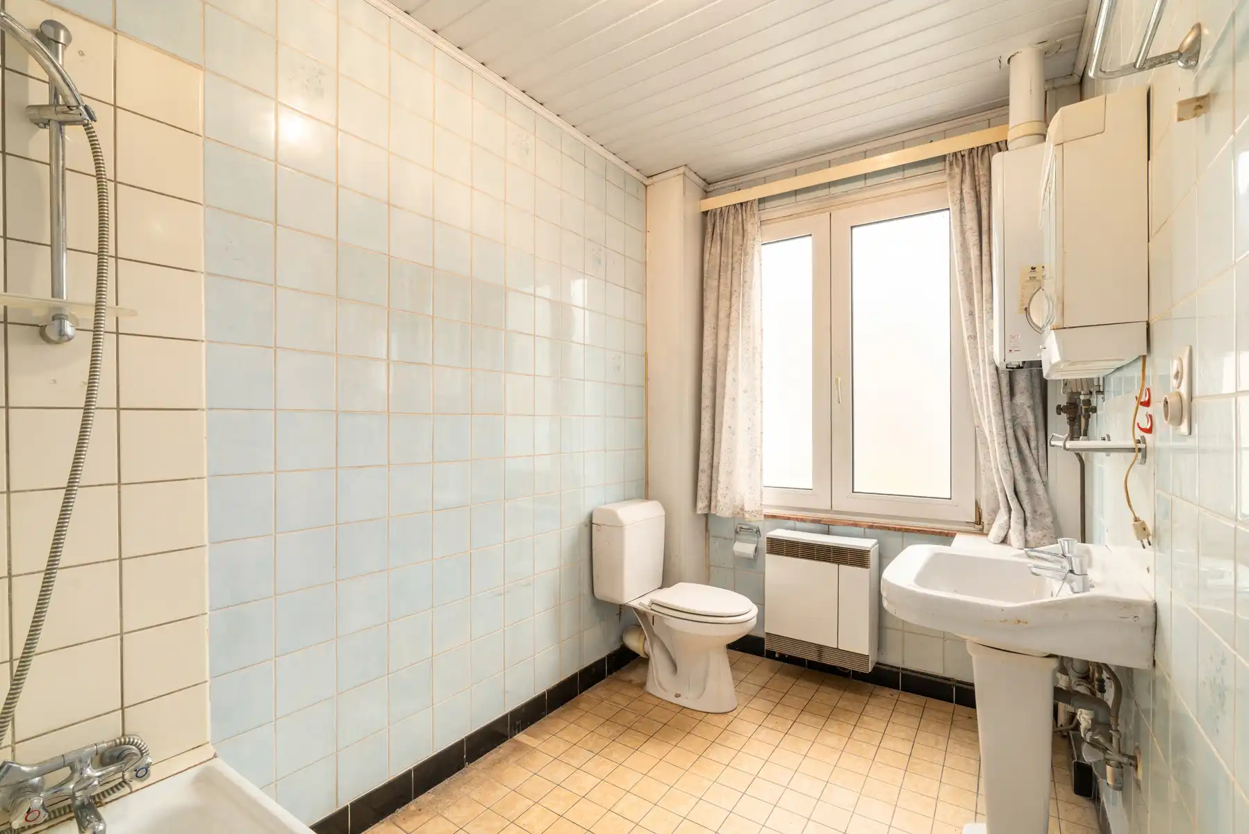 Investeringseigendom met 3 appartementen en tuin foto 15
