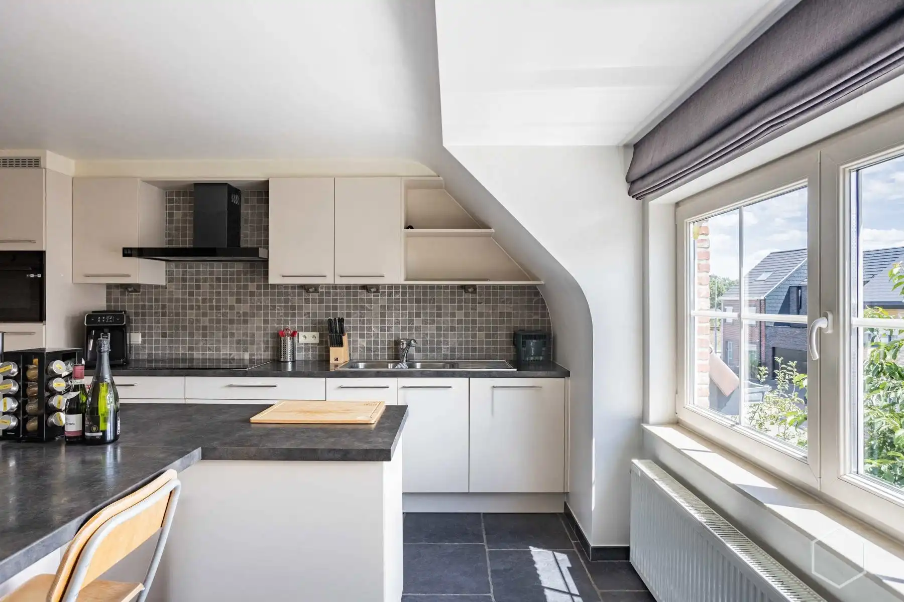 Lichtrijk duplexappartement met 4 slaapkamers en airco's foto 15