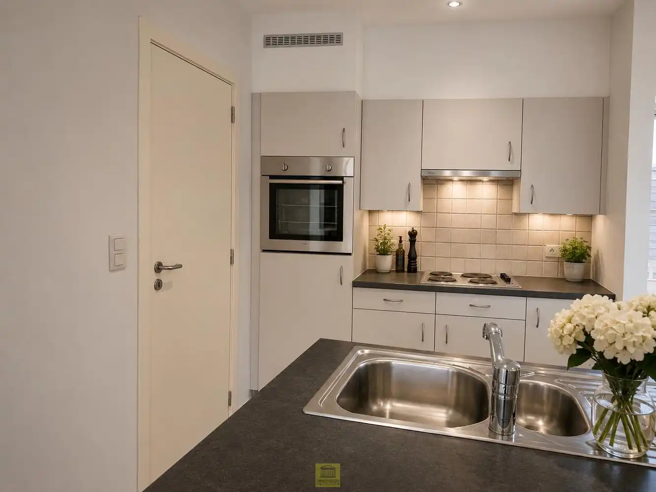 Lichtrijk 1-slaapkamerappartement in het hart van Lede foto 3