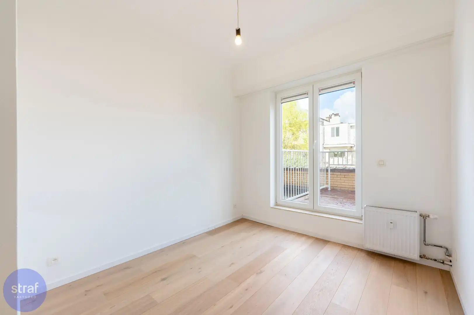 TE HUUR/ Gerenoveerd appartement met 2 slaapkamers, groot terras en zicht op het Galgenweel + 2 kelderbergingen foto 10