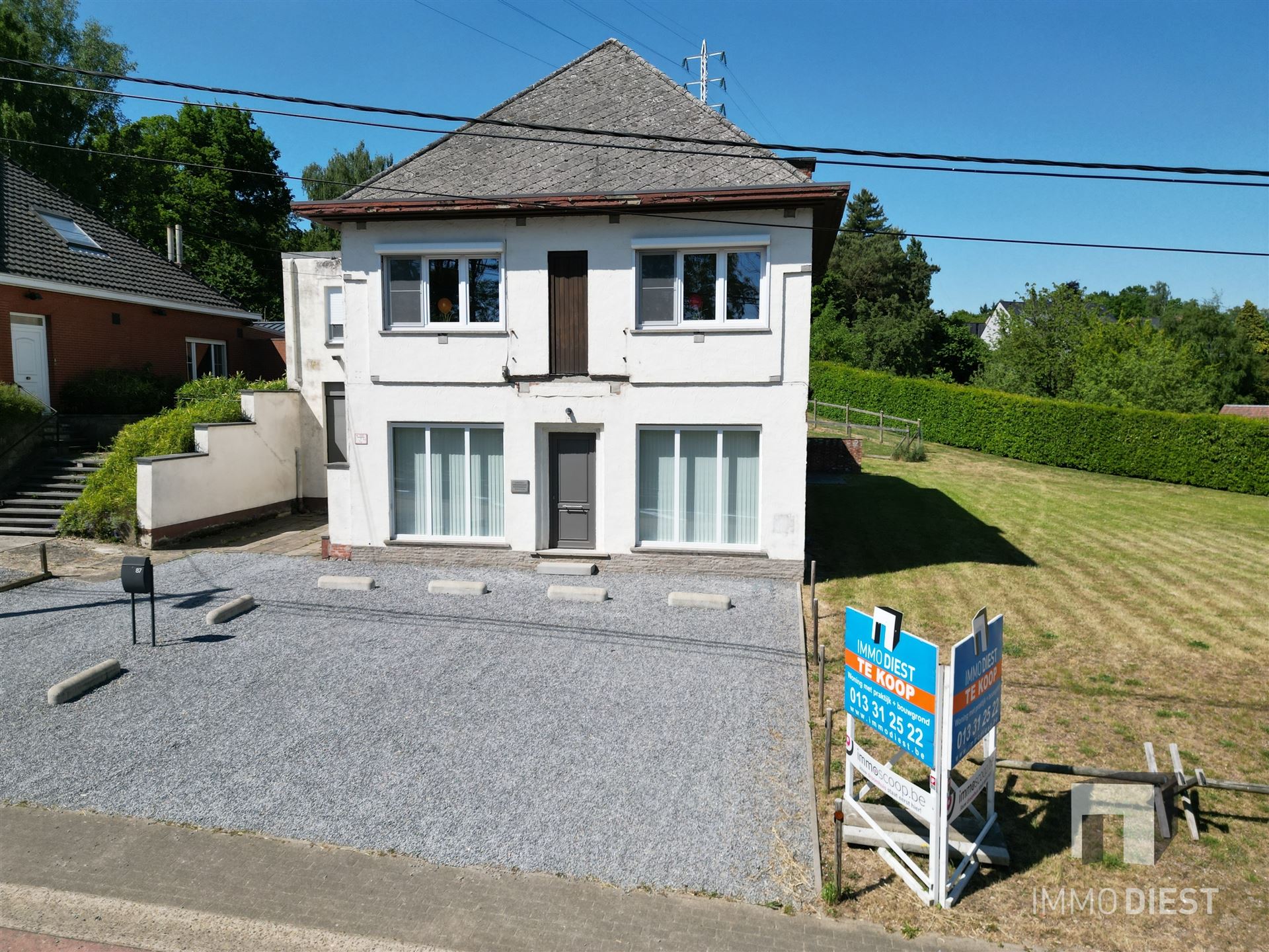 Unieke woning met praktijk en bouwgrond op zichtlocatie foto 3