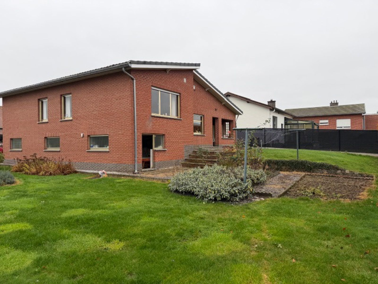 Charmante splitlevelwoning 2 slpks en grote garage te Tienen foto 20