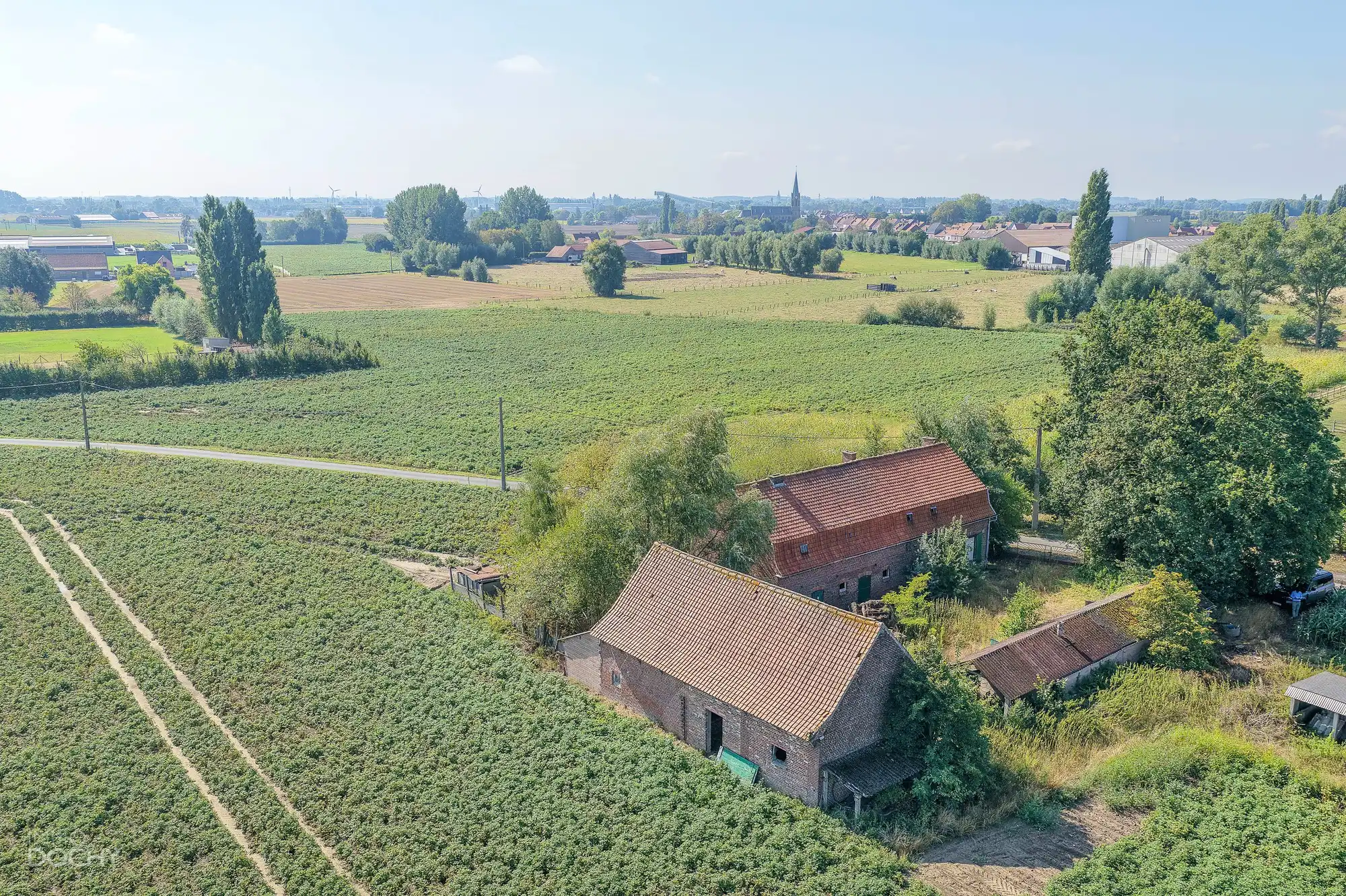 Hoofdfoto van de publicatie: Hoeve op ca 7ha met  vergunning voor nieuwbouw