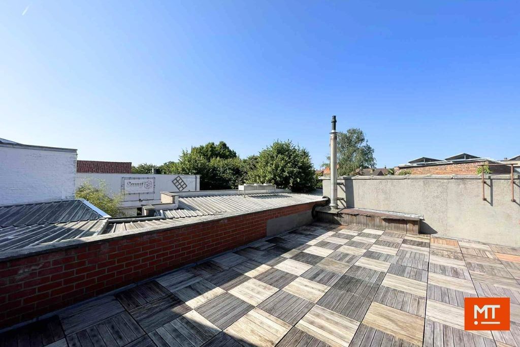 Veelzijdig gebouw bestaande uit handelsruimte, woning en appartement in het centrum van Wervik foto 23