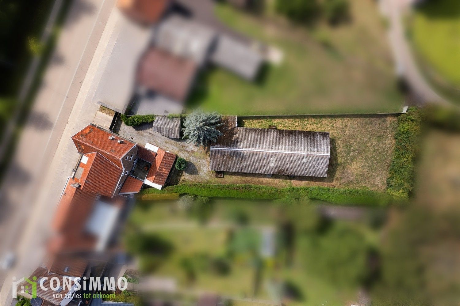 Te renoveren gezinswoning met loods en kantoorruimte op zichtlocatie in Sint-Truiden foto 7