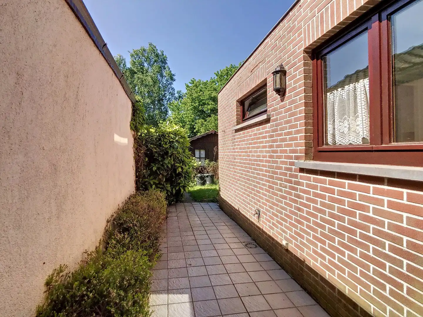 Centraal gelegen woning met twee ruime slaapkamers, zonnige tuin en droge kelder - EPC 252 kWh/m² - bewoonbare oppervlakte van 143 m² foto 18