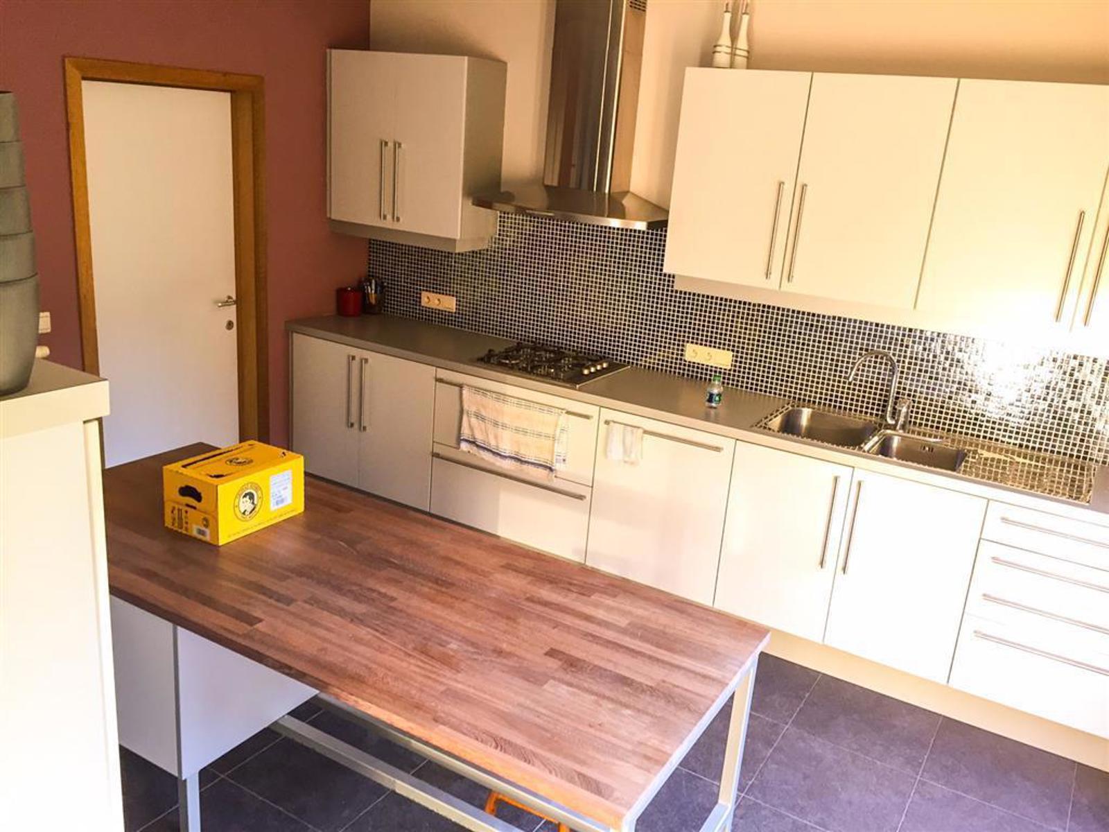 Halfopen bebouwing met 4 slaapkamers, garage en tuin foto 3