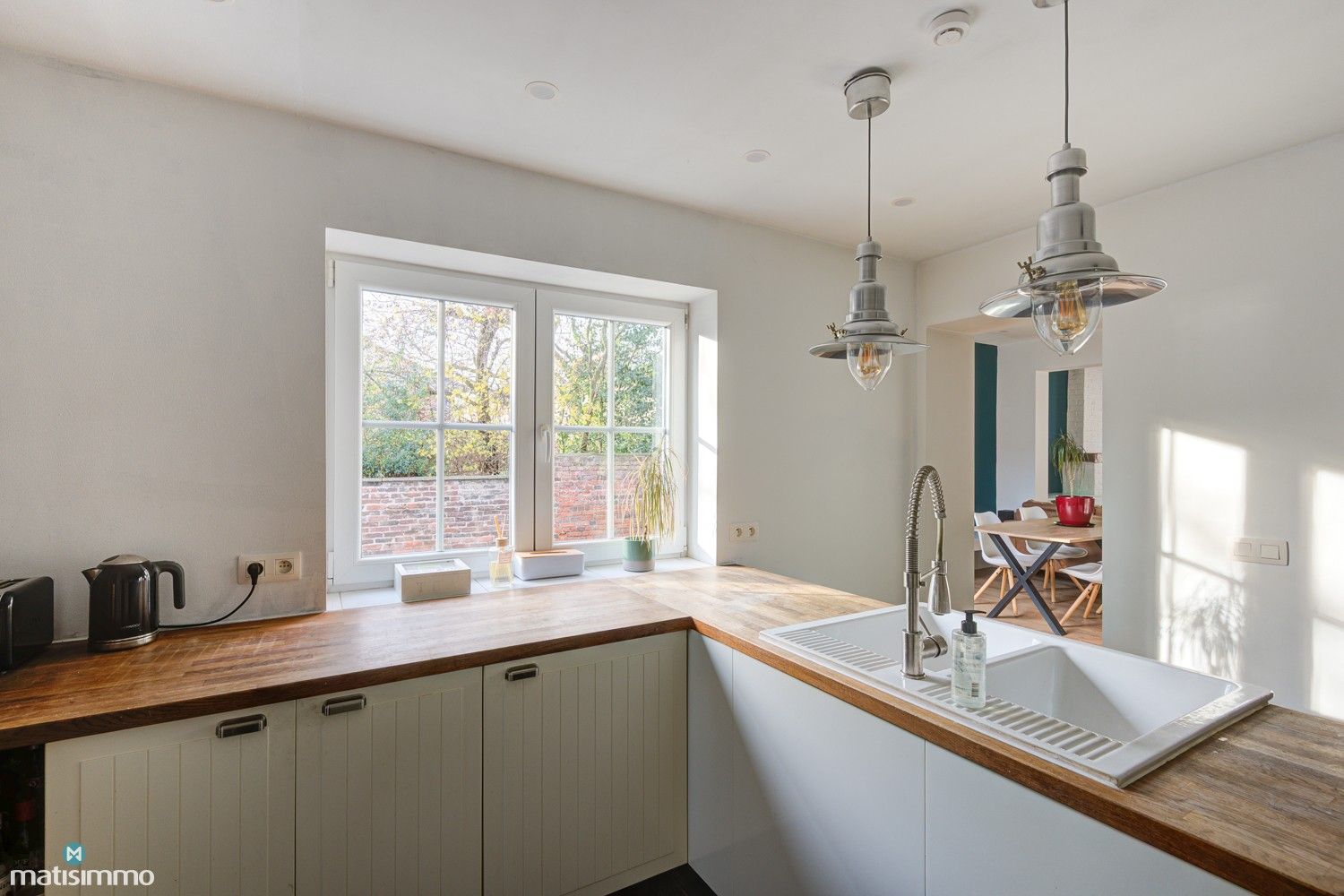 GROTENDEELS GERENOVEERDE GEZINSWONING MET ZUIDGERICHTE TUIN IN MILLEN foto 8