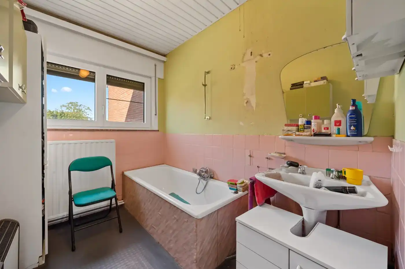 Charmante rijwoning met 3 slaapkamers, tuin en garage in hartje Tienen foto 16