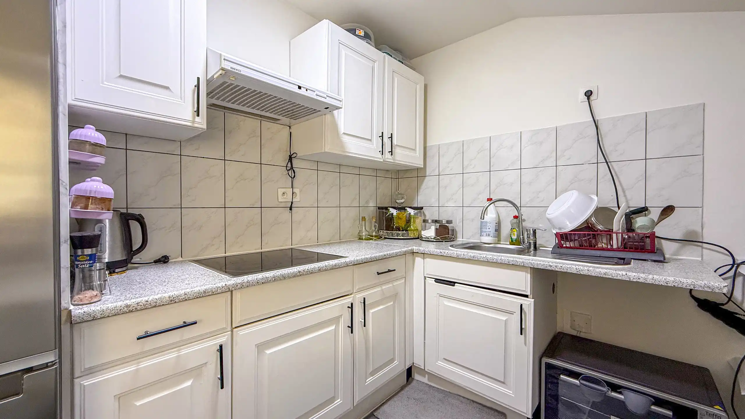 Instapklaar appartement met 2 slpks, balkon, tuin + parking! foto 8