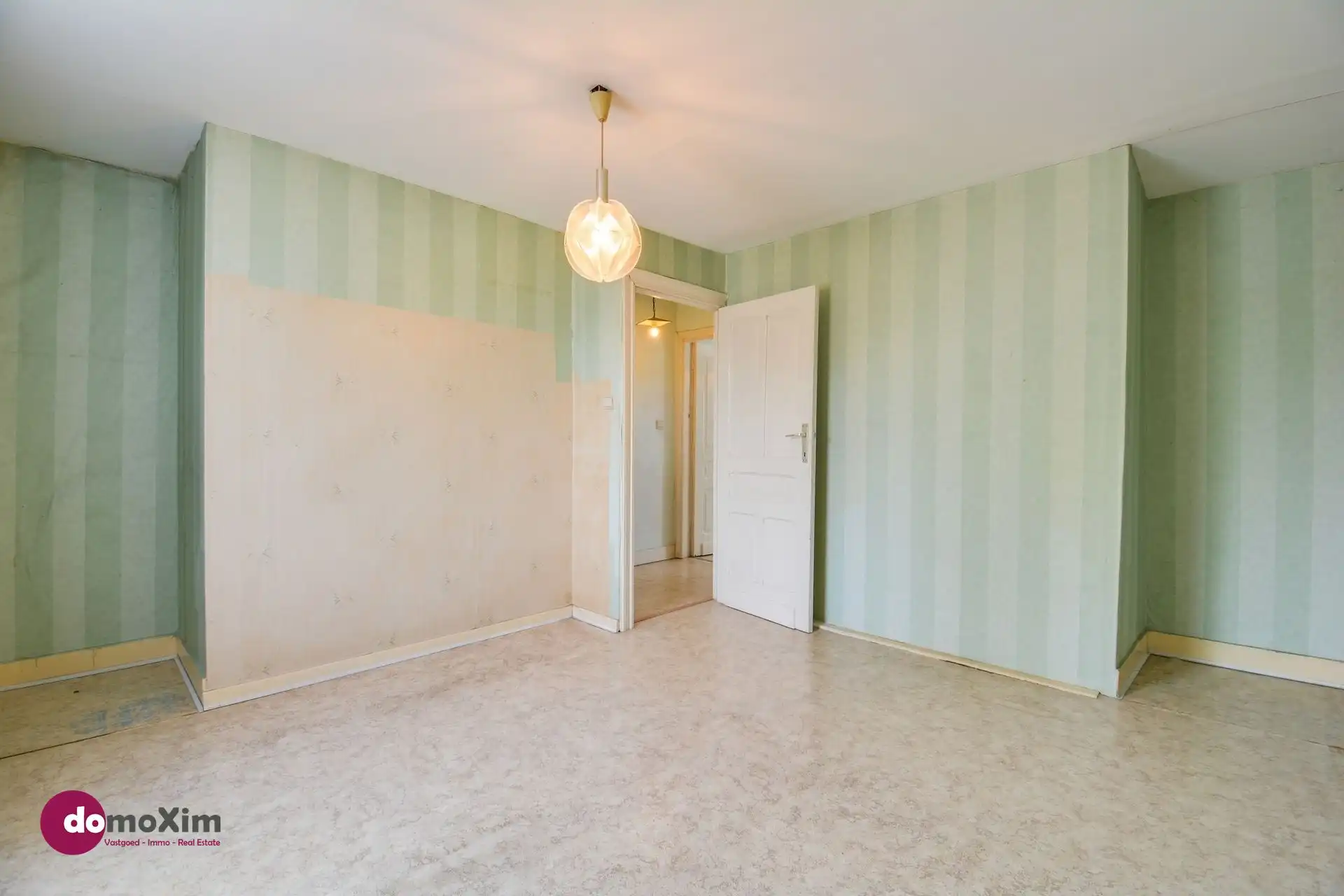 Te renoveren woning op bereikbare locatie in Boortmeerbeek foto 11