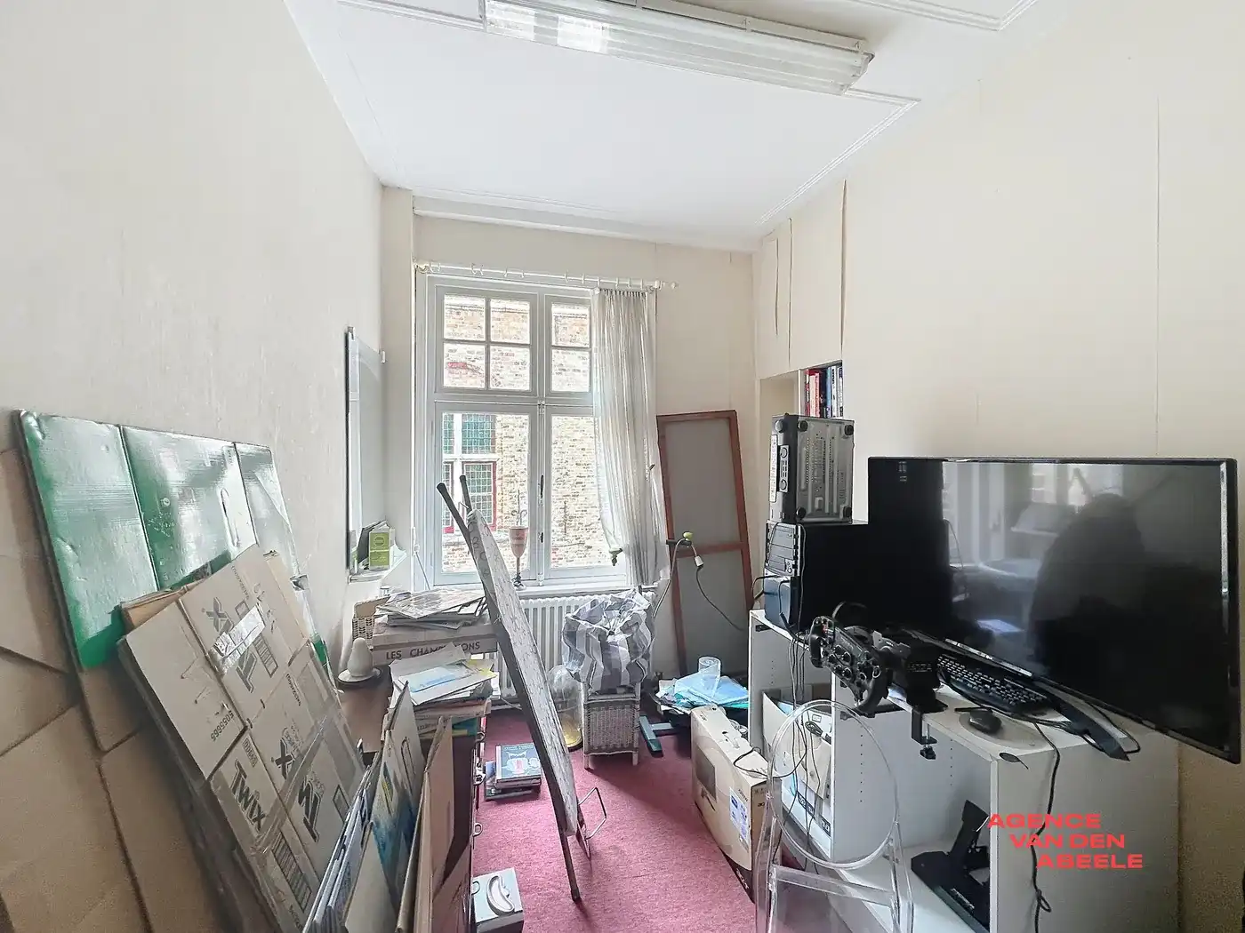 Centraal gelegen handelswoning met 4 slaapkamers en riante tuin  foto 14