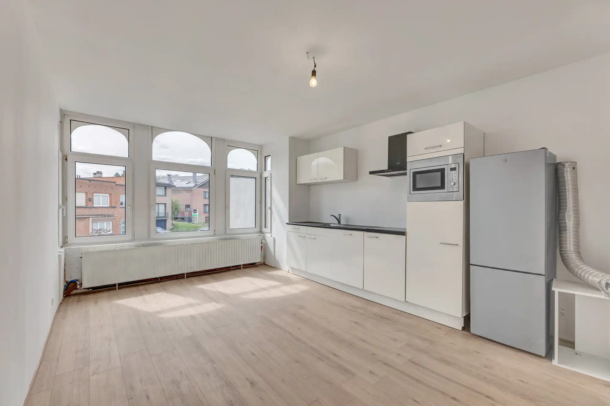 Gerenoveerd handelshuis op strategische locatie te Dilbeek! foto 6