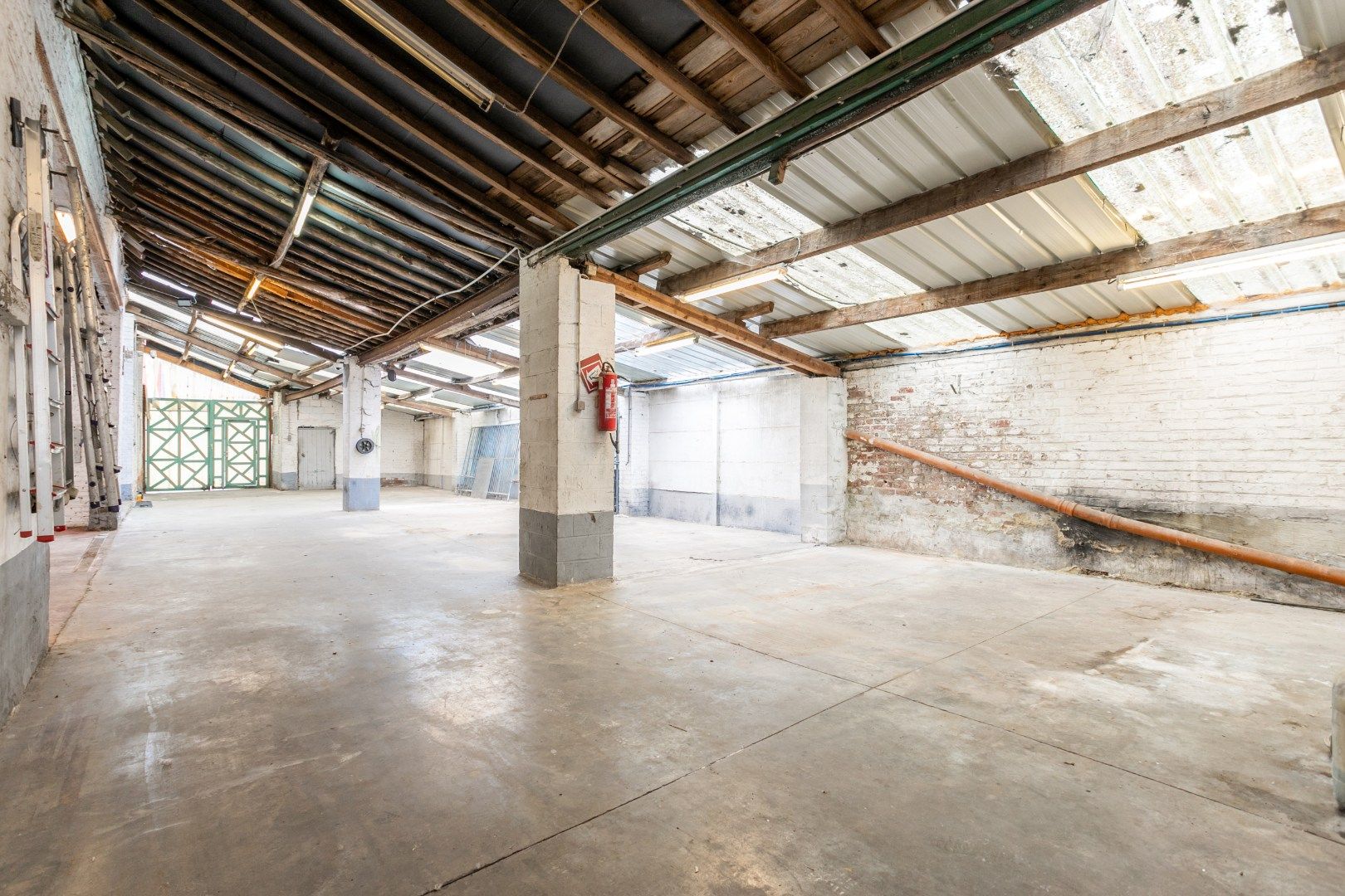 Te renoveren woning met loods nabij centrum Halle foto 24