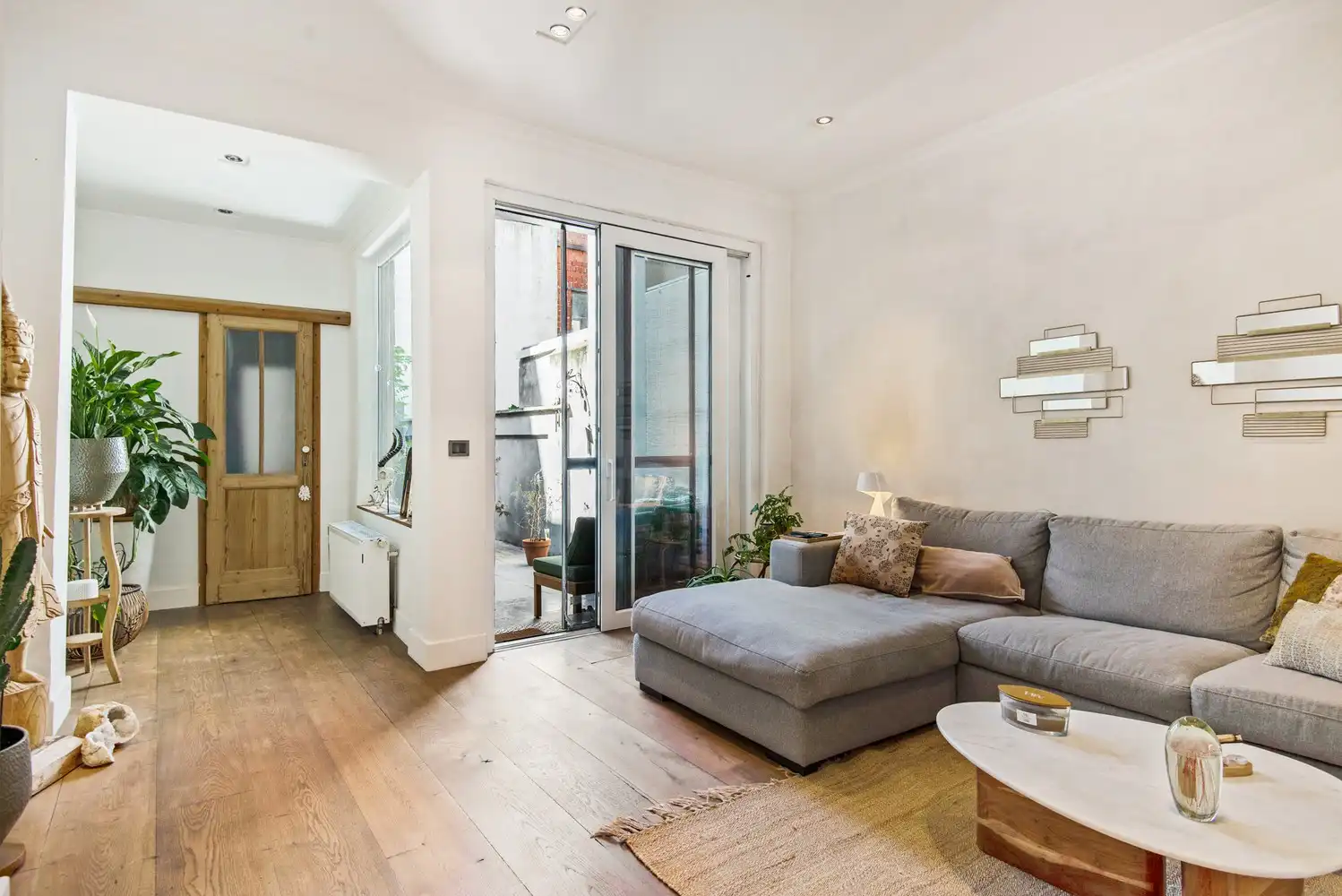 Instapklare woning met gezellige stadstuin foto 10
