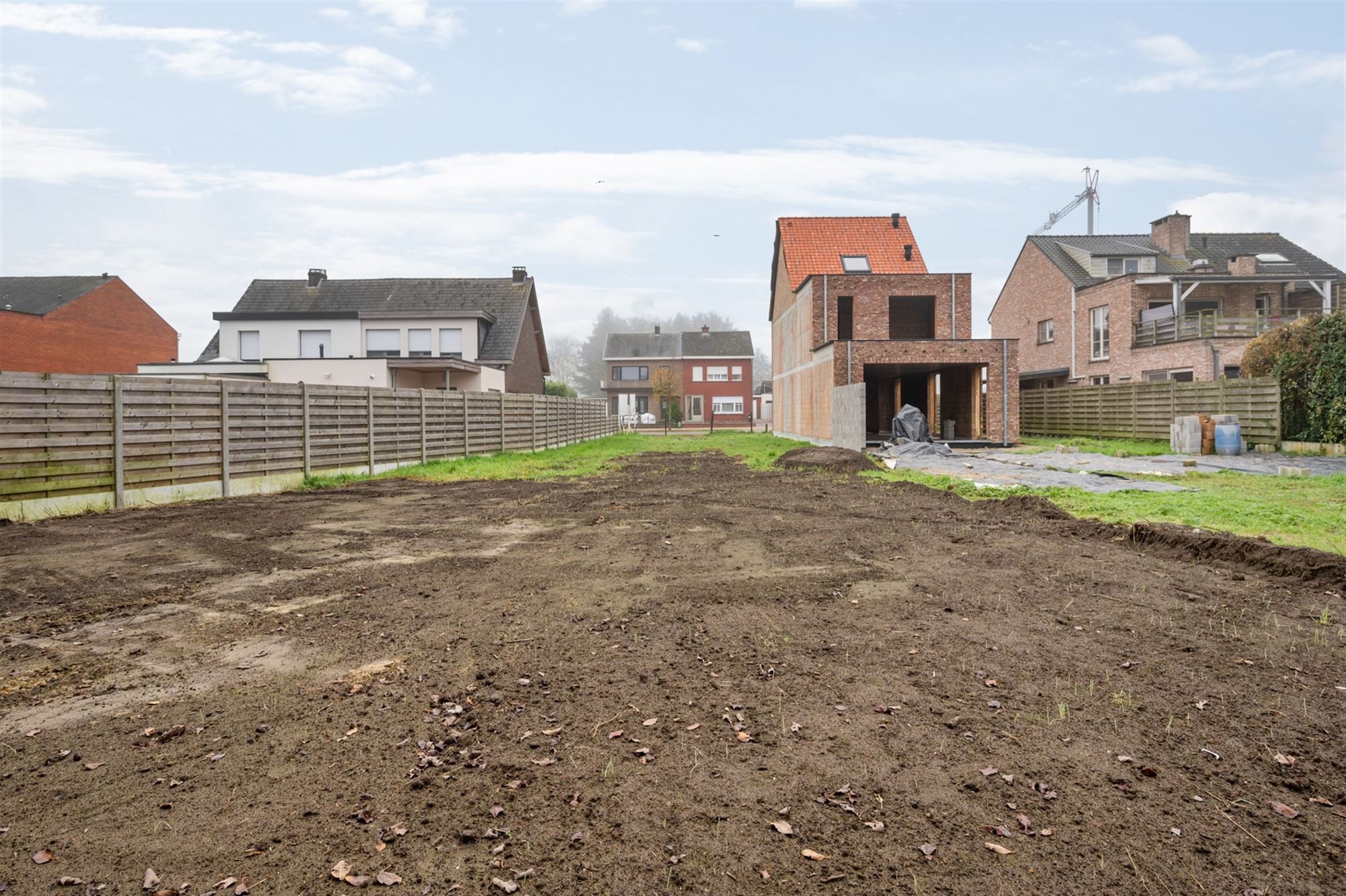 Perceel bouwgrond (650 m2) voor half open bebouwing niet ver van het centrum foto 9