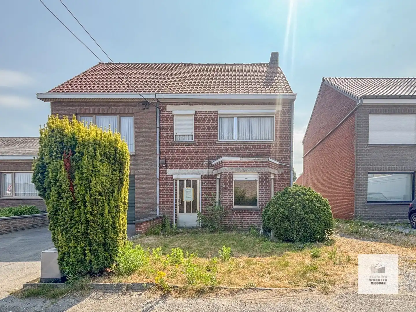 Bouwgrond met af te breken woning op 1100m2 te Zwevezele foto 2