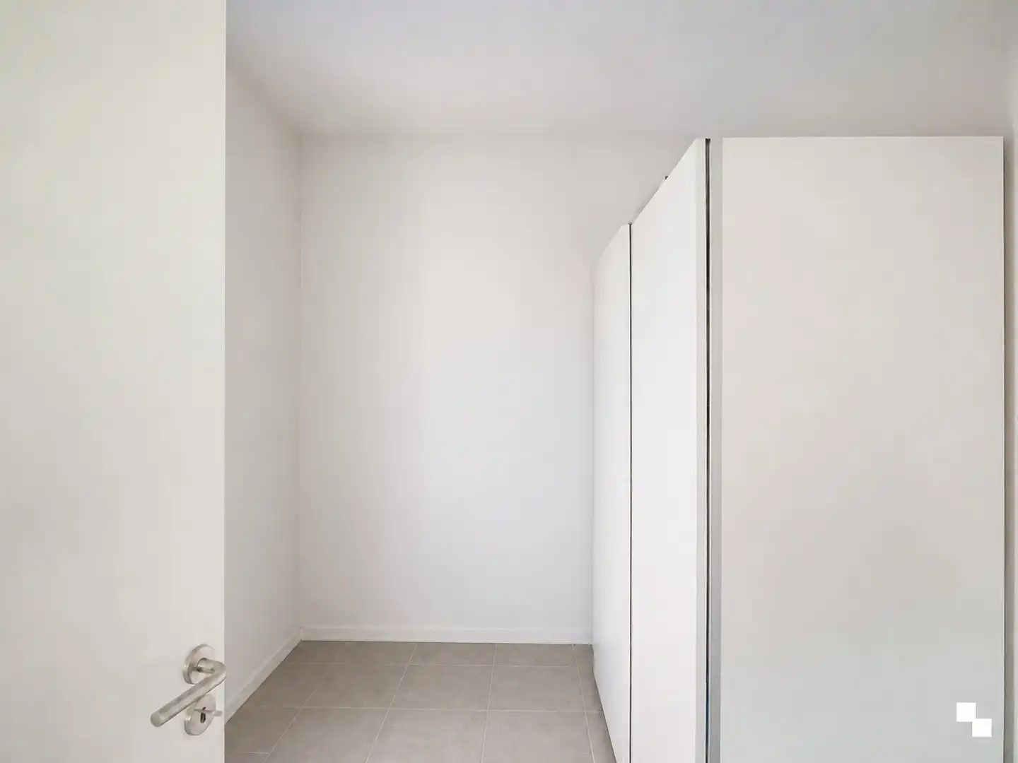 Gelijkvloers appartement omgeven door groen aan de Sint-Denijskerk foto 11