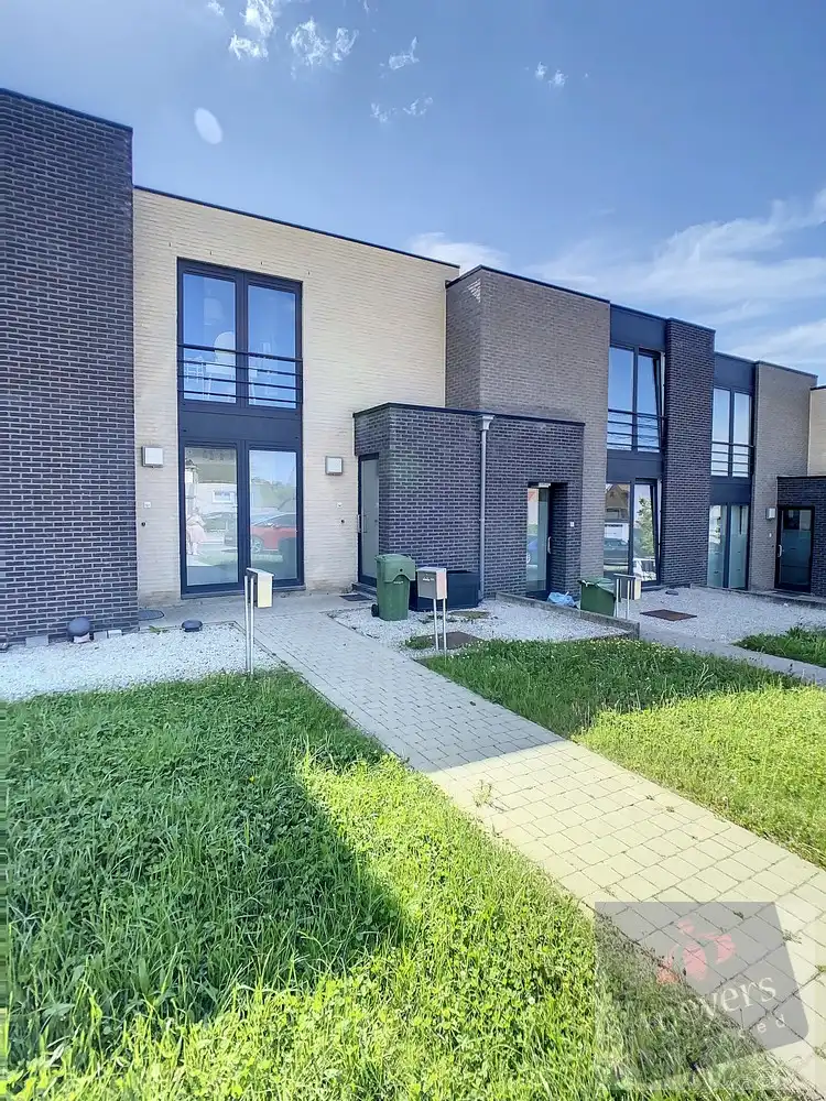 Halfopen bebouwing met tuin in rustige woonwijk te Borgloon foto 2