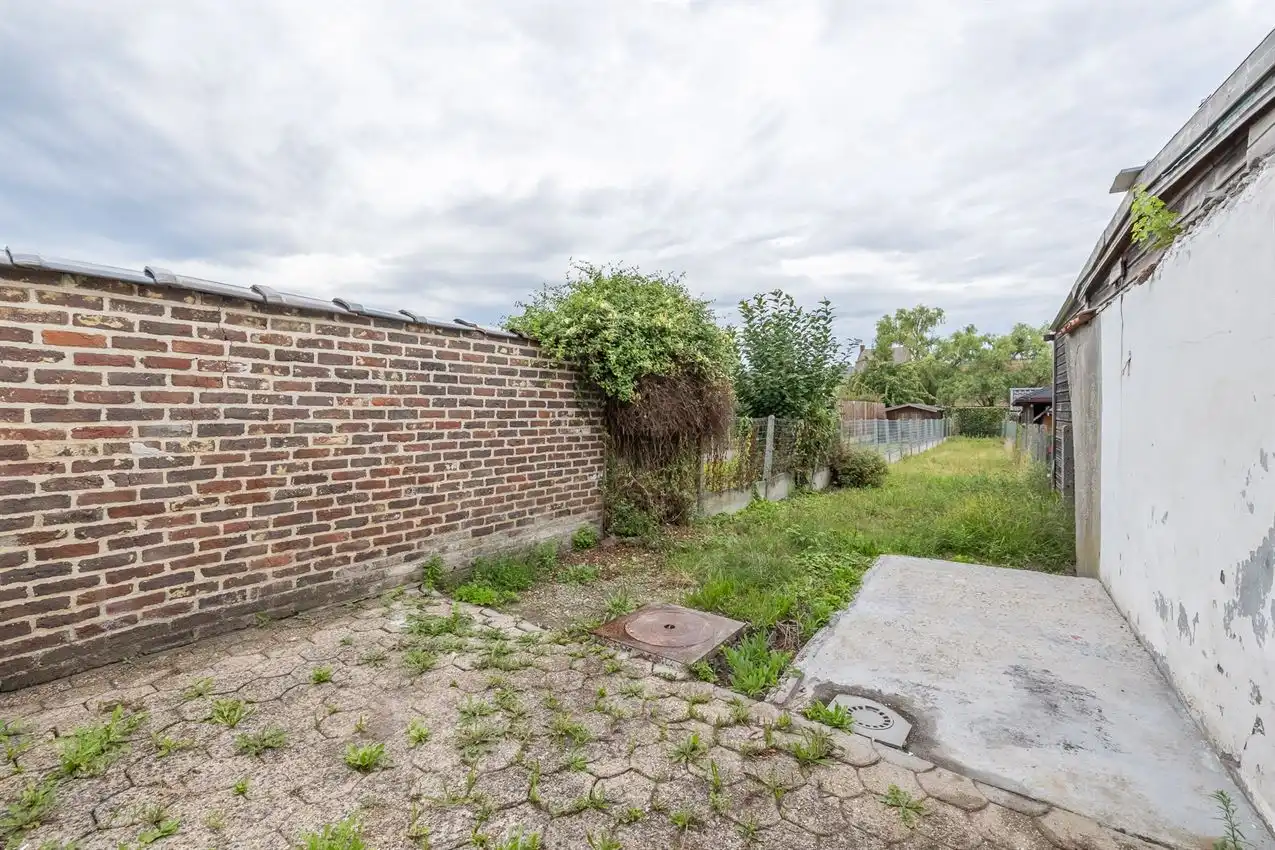 Vernieuwde rijwoning met drie slaapkamers en mooie tuin foto 9