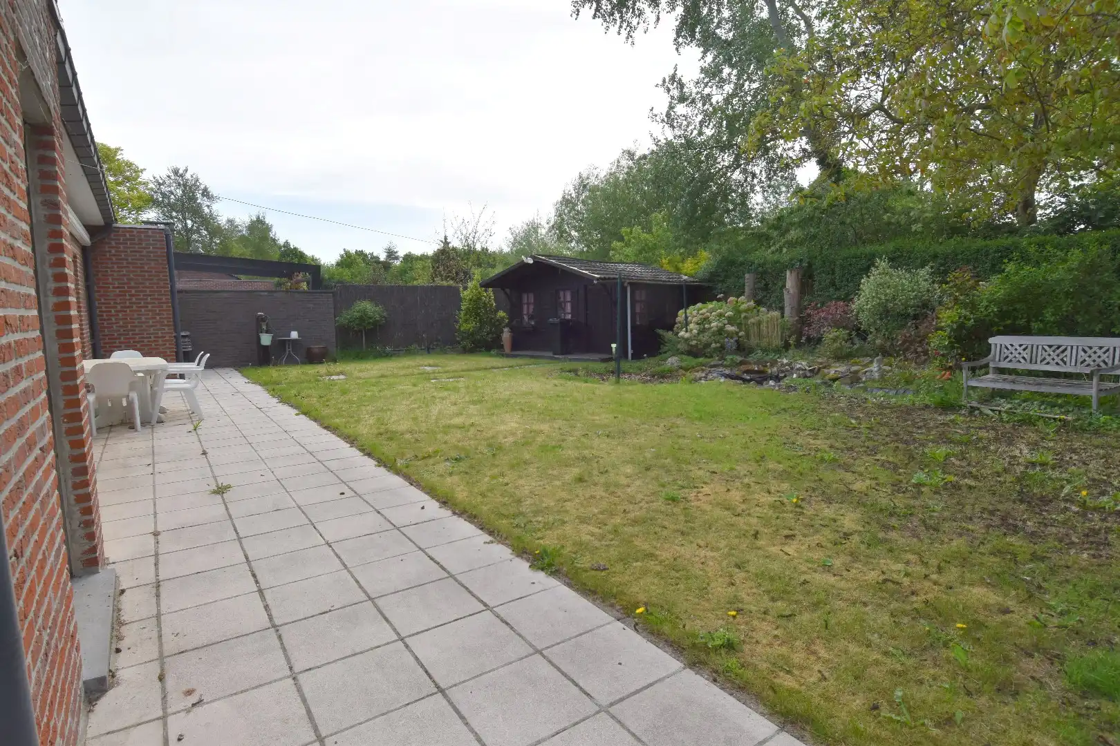 Ruime half open gelijkvloerse woning met tuin, garage en 3 slaapkamers in Harelbeke foto 16