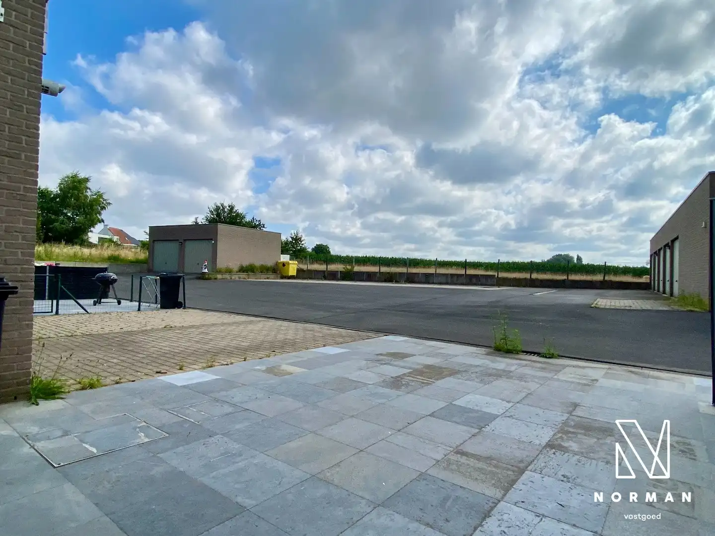 Gerenoveerd gelijkvloers appartement met 2 slaapkamers en inpandige garage en zonneterras! foto 13