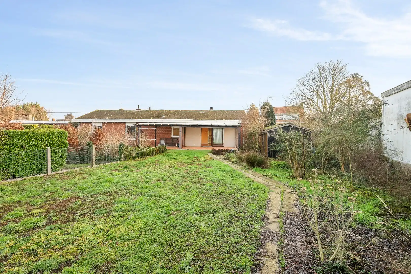 Gelijkvloerse woning met 3 slaapkamers, ruime garage en tuin. foto 21