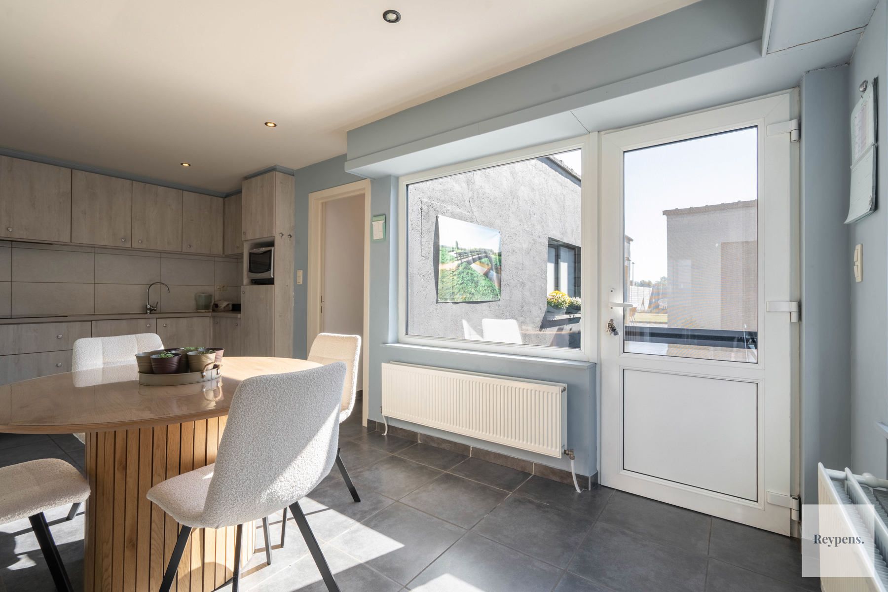 Instapklare woning met grote zonnige tuin op toplocatie! foto 7